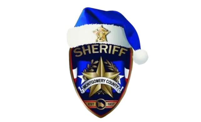 Montgomery County Sheriff badge wearing a blue and white Santa hat.