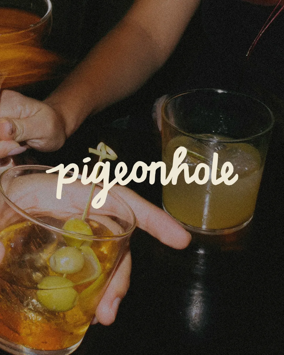 Open brand guideline booklet showing a colour palette with terracotta, blue, off white, black, and white colors, alongside social media design elements including a phone screen mockup and logo.