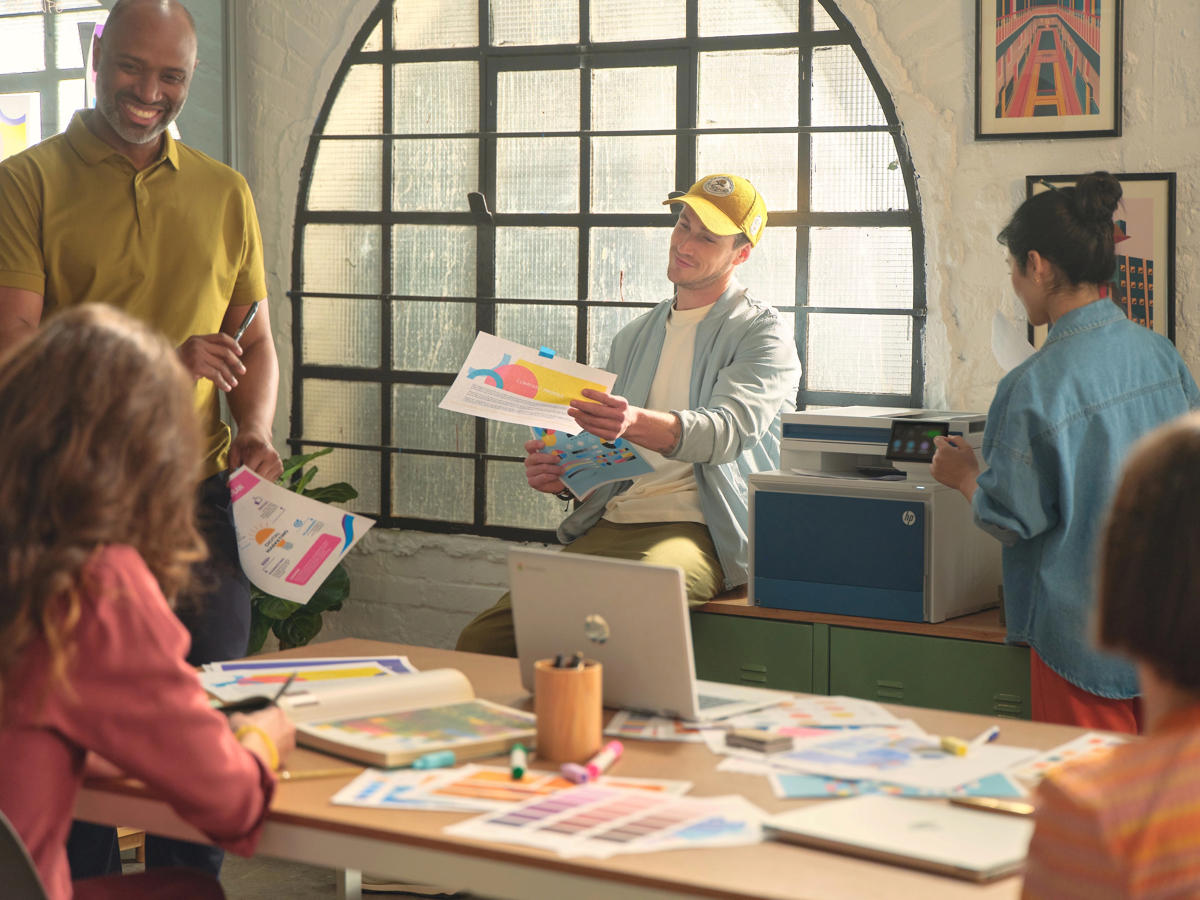 image of a notebook and a coffee cup on a desk