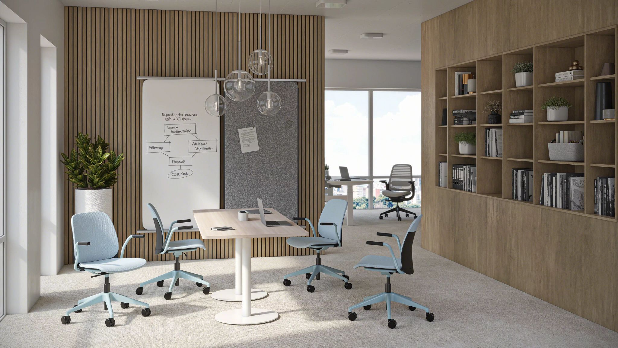 Modern office meeting area with light blue swivel chairs around a wooden table, a plant, whiteboard with business notes, and shelving with books and plants.