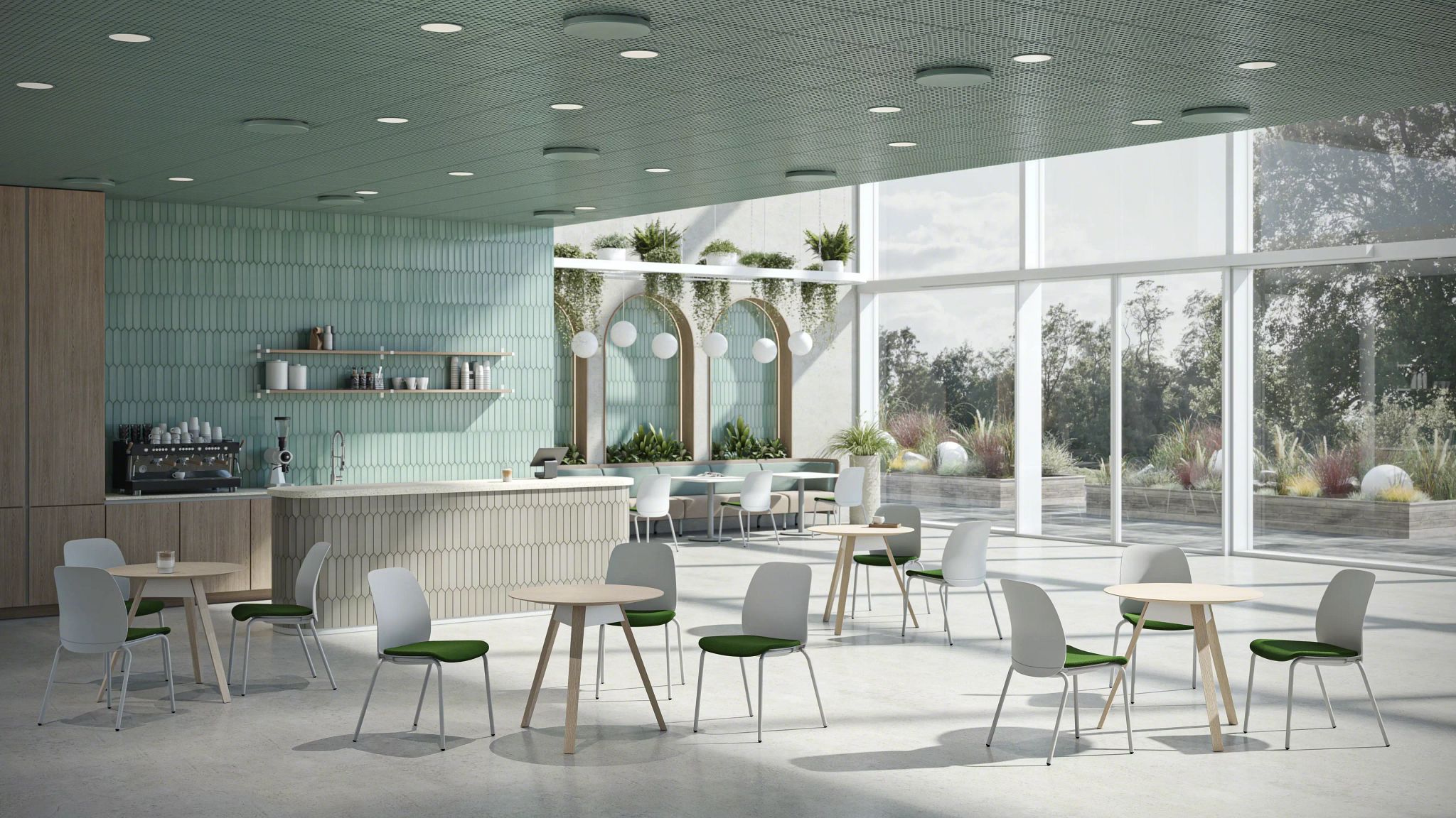 Modern bright cafe interior with round tables, white chairs with green cushions, and large windows showing outdoor plants.
