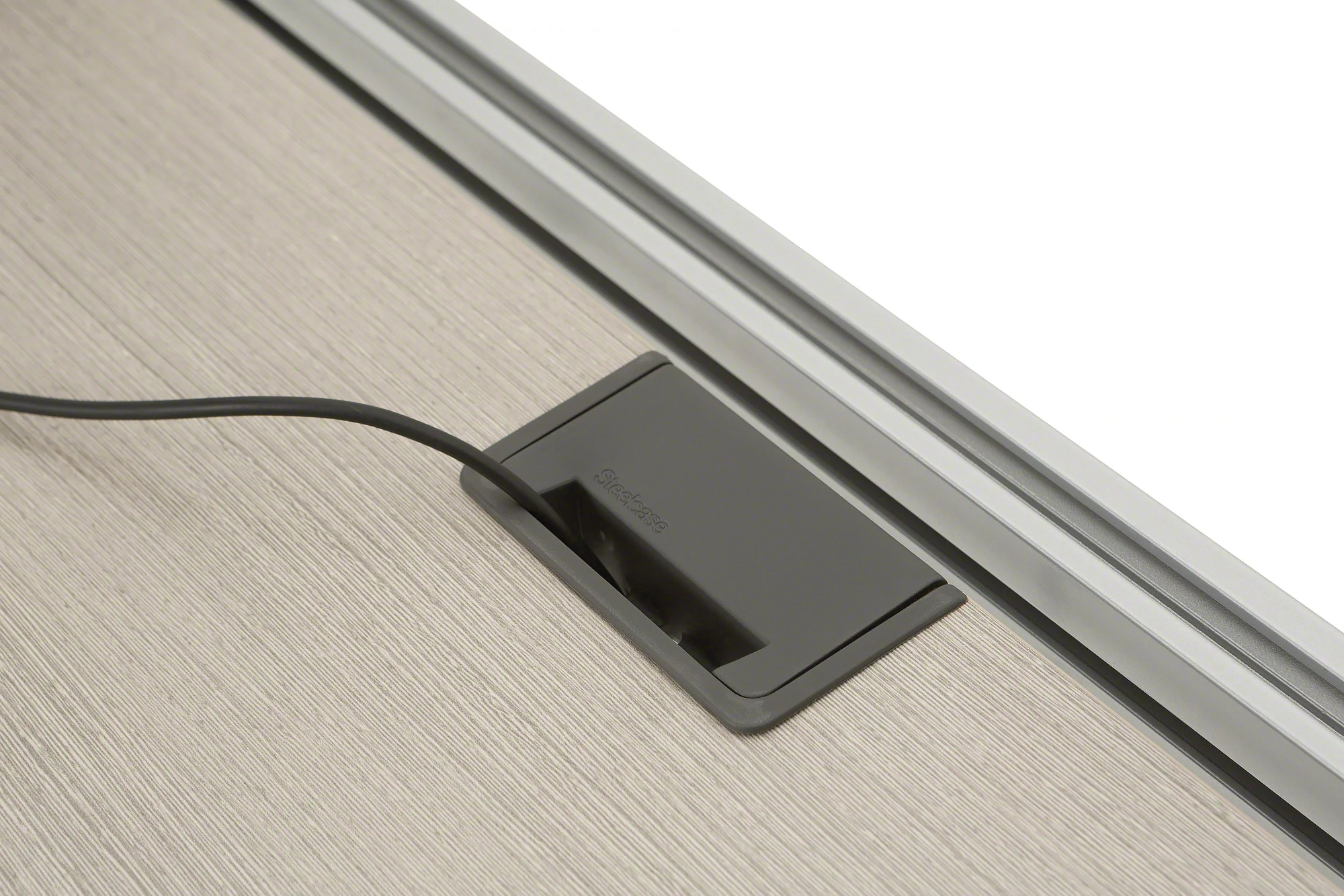 Steelcase Ology height-adjustable desk in a modern law office workstation