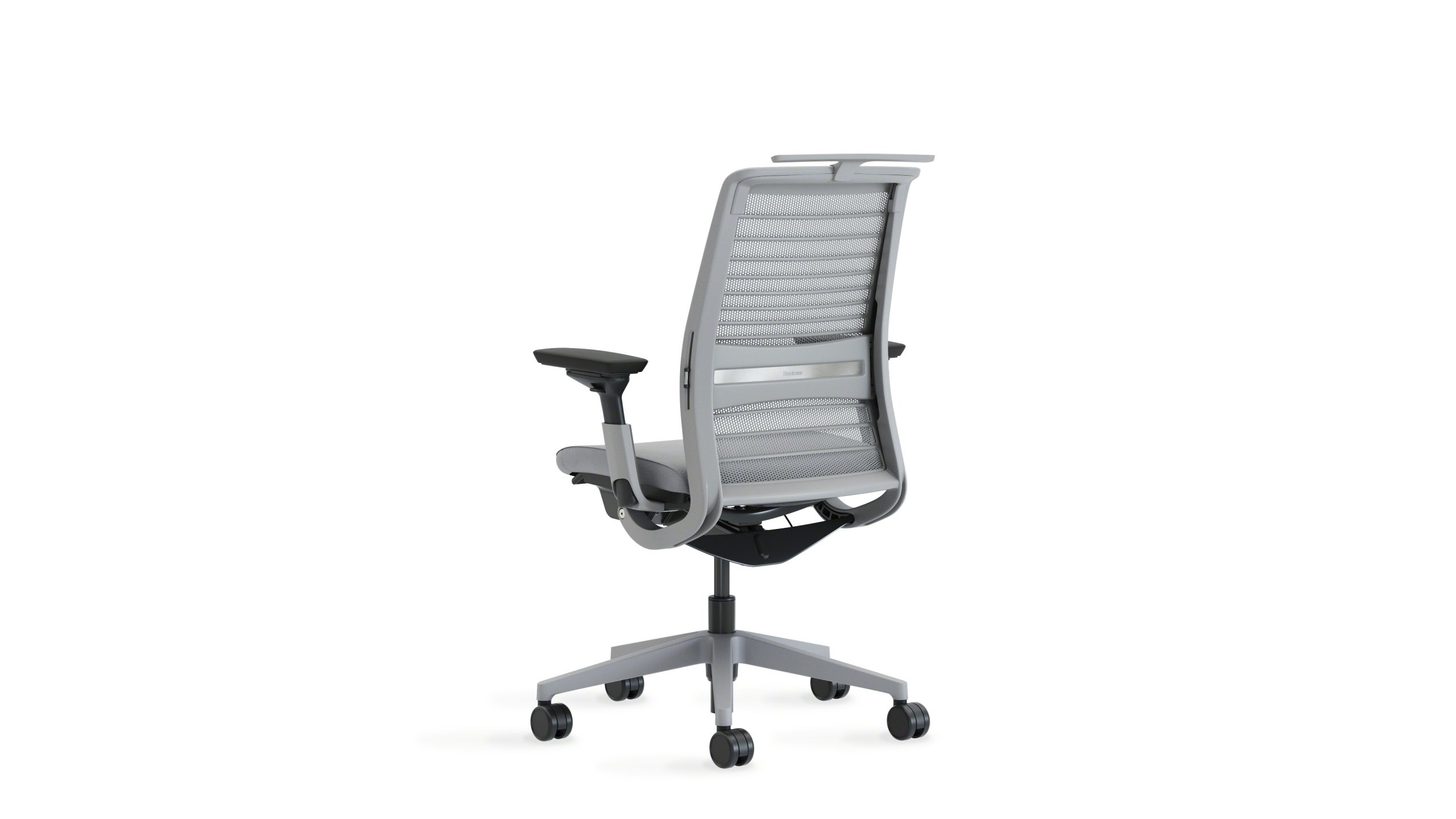 Steelcase Think ergonomic task chair at a modern desk setup