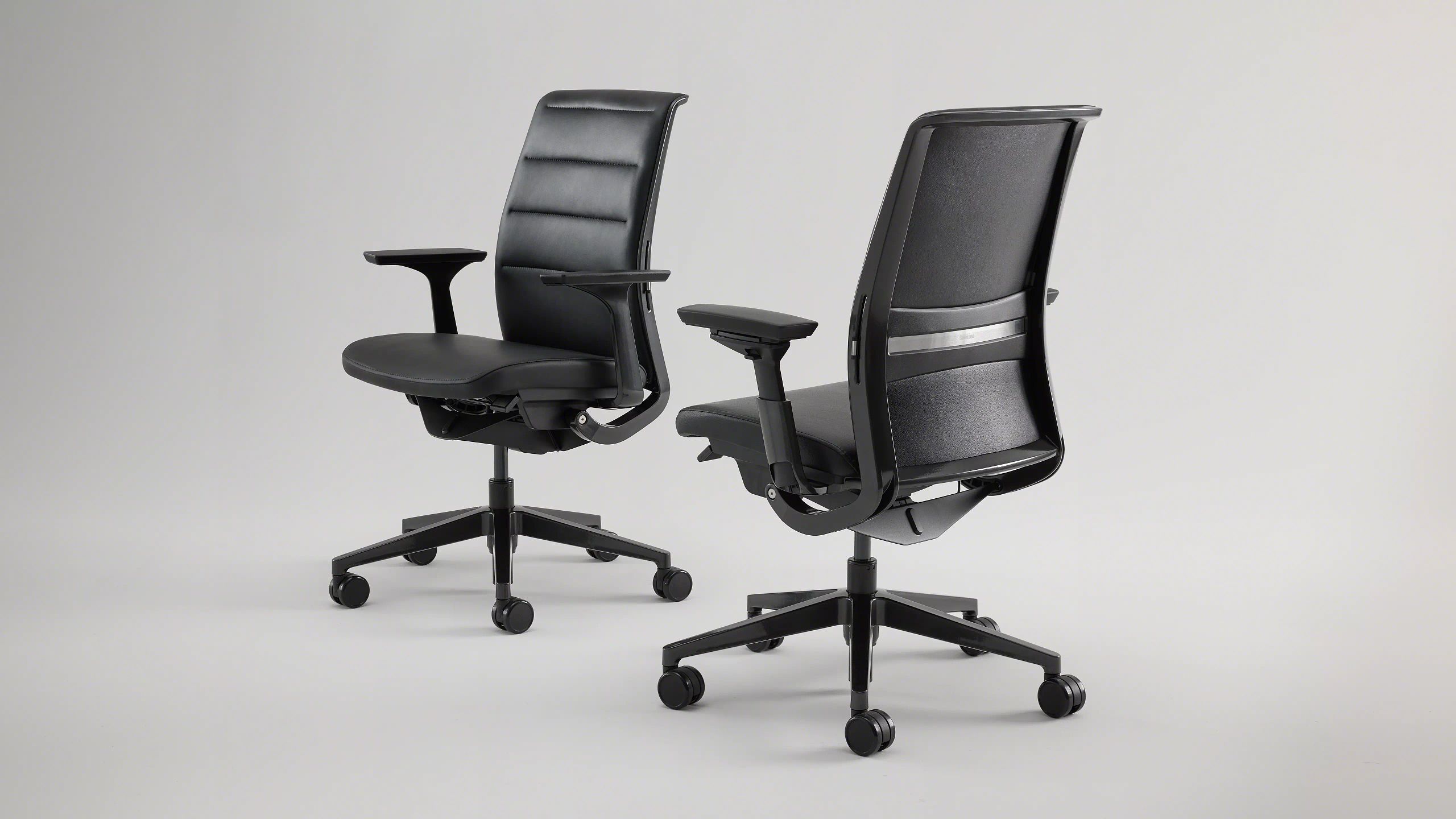 Steelcase Think ergonomic task chair at a modern desk setup