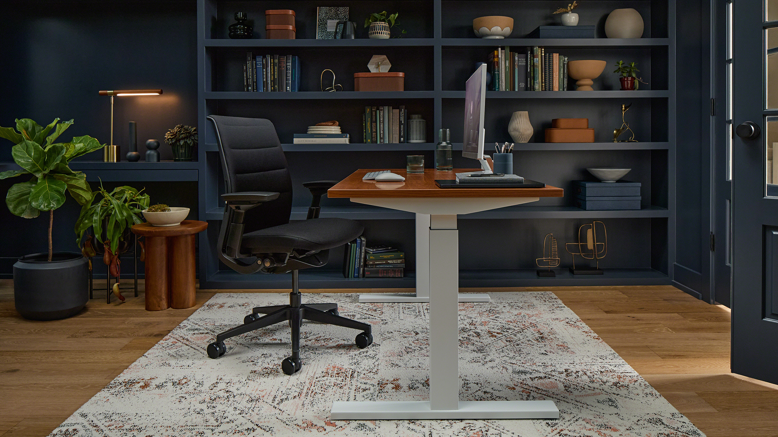 Steelcase Think ergonomic task chair at a modern desk setup