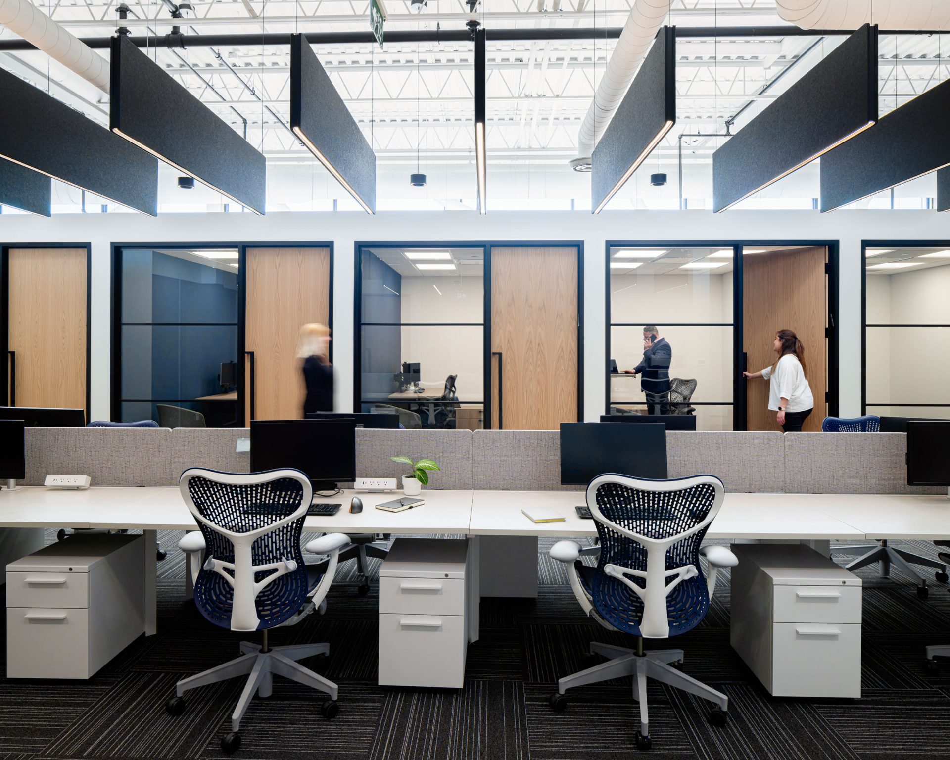 Swing door glass office partitions for private meeting rooms