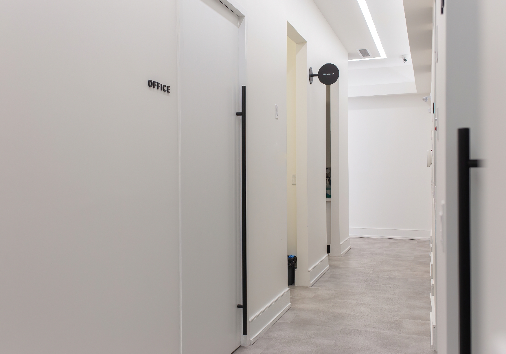 Pivot door office partition system creating private workspace areas