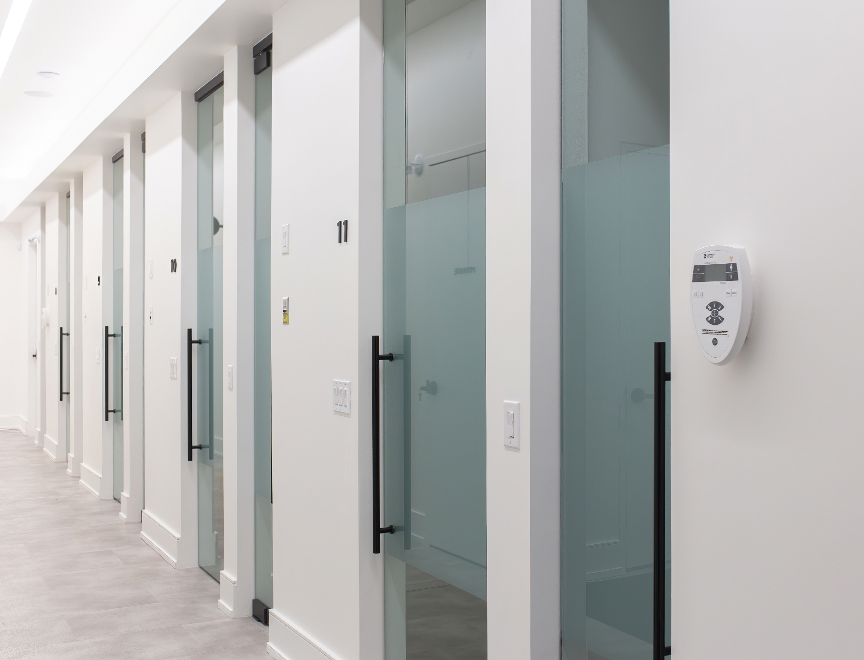 Pivot door office partition system creating private workspace areas