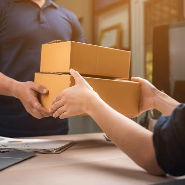A Cuzor Router UPS in its cardboard box, packed and ready to go