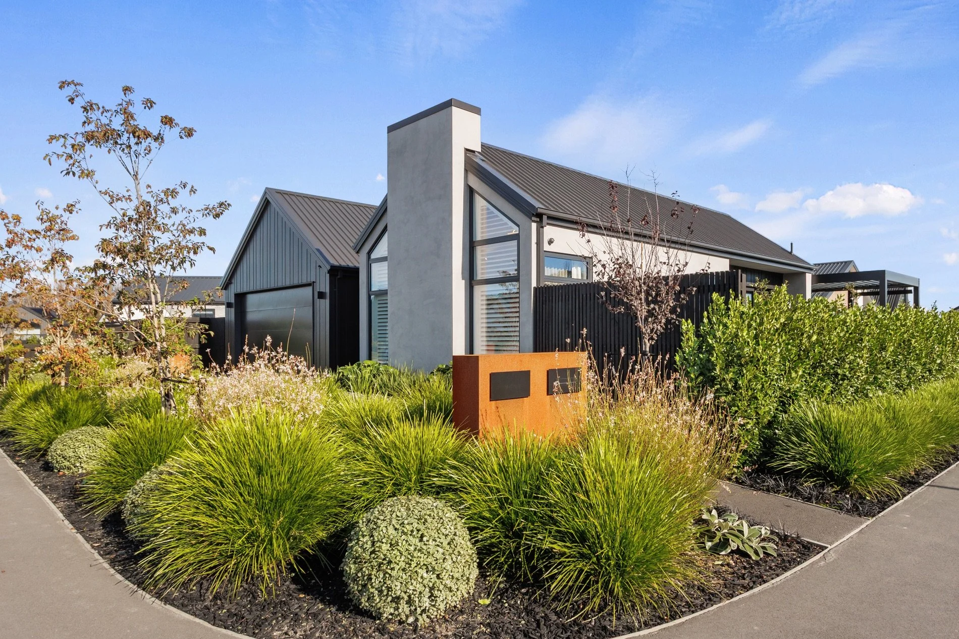 4B. An engaging front garden and a welcoming street frontage.