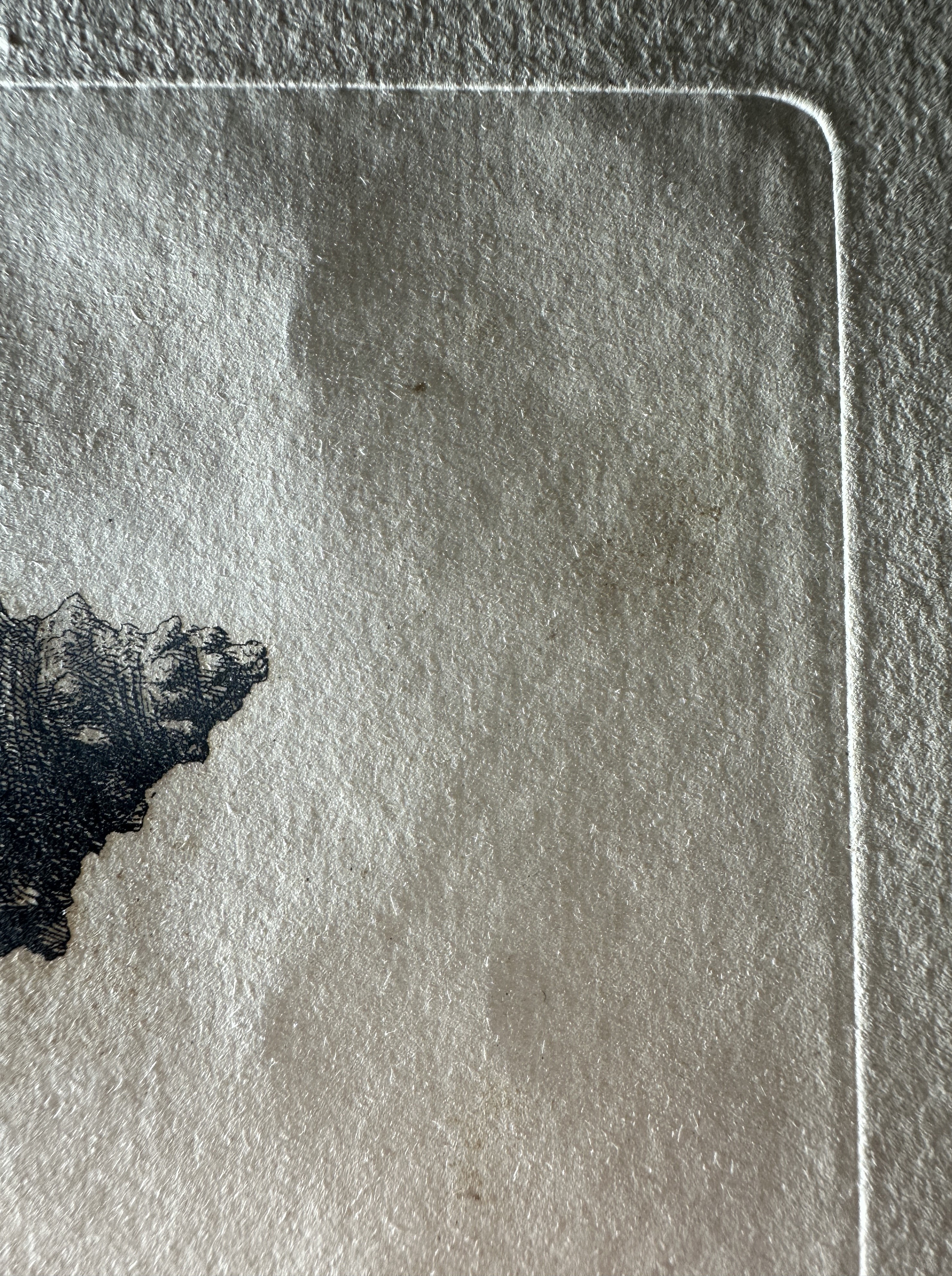 Plate mark in the upper right