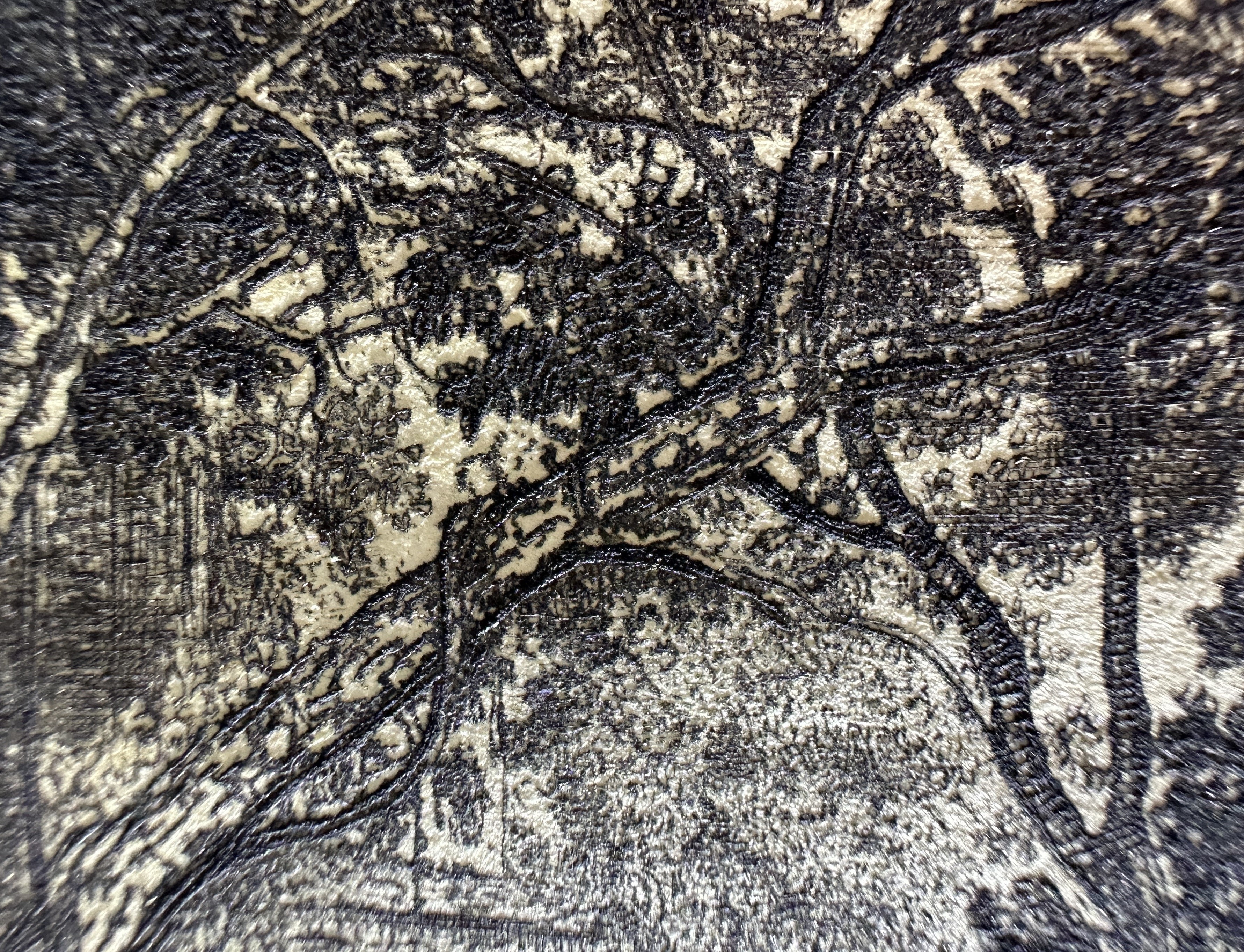 III. Arboreal structure — dense etched linework with residual burr