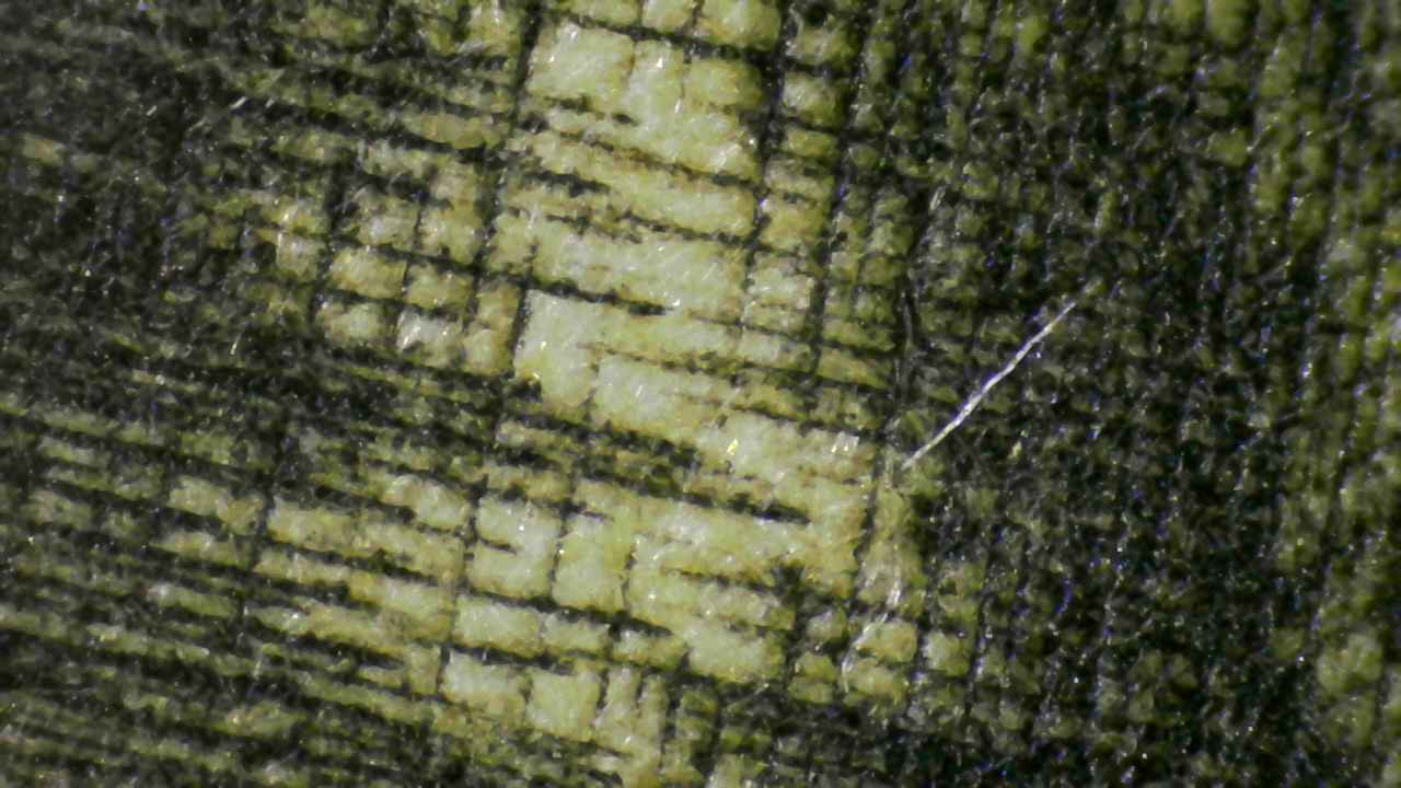 Ink–fiber integration point.