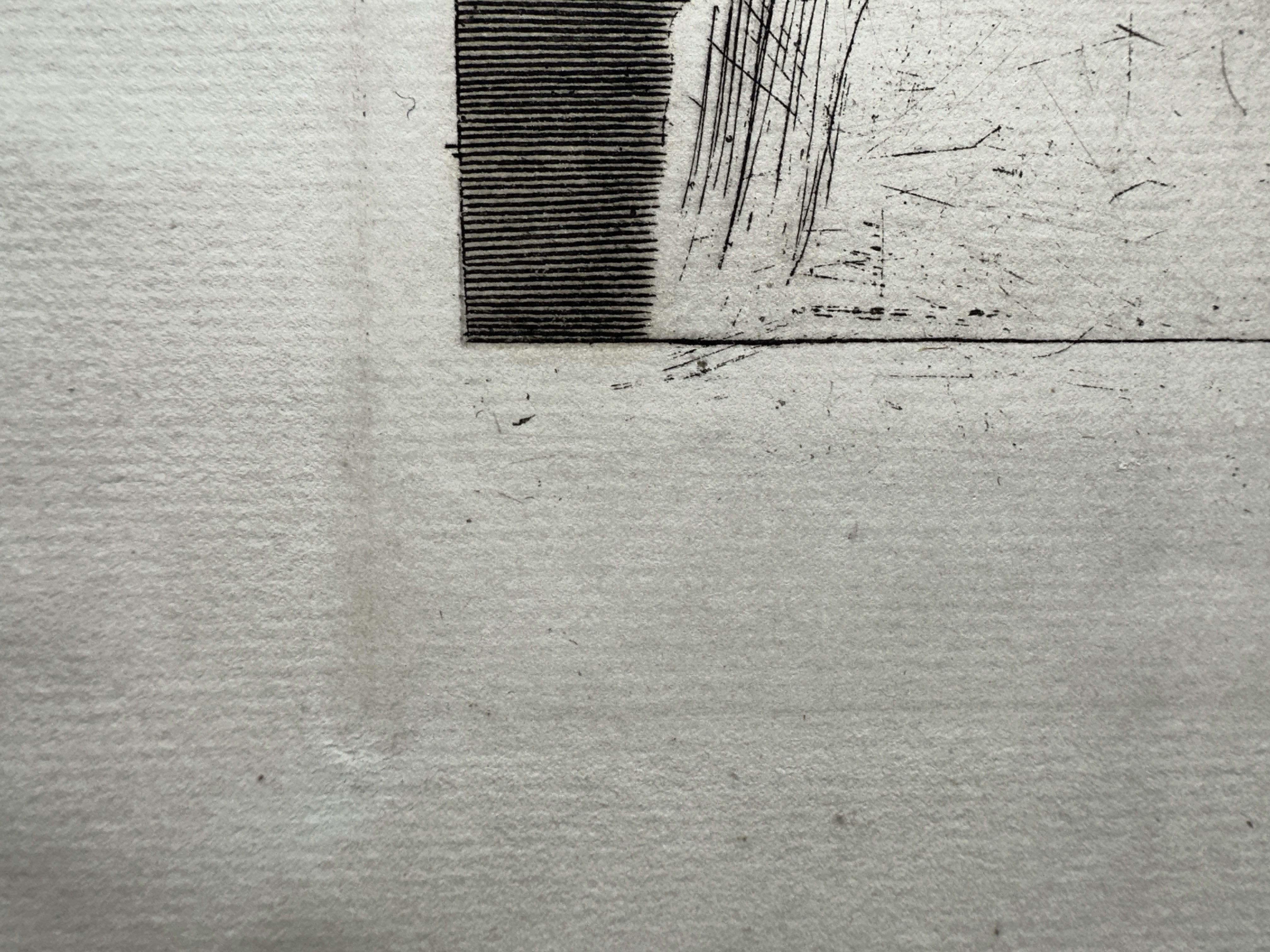 Platemark, lower left