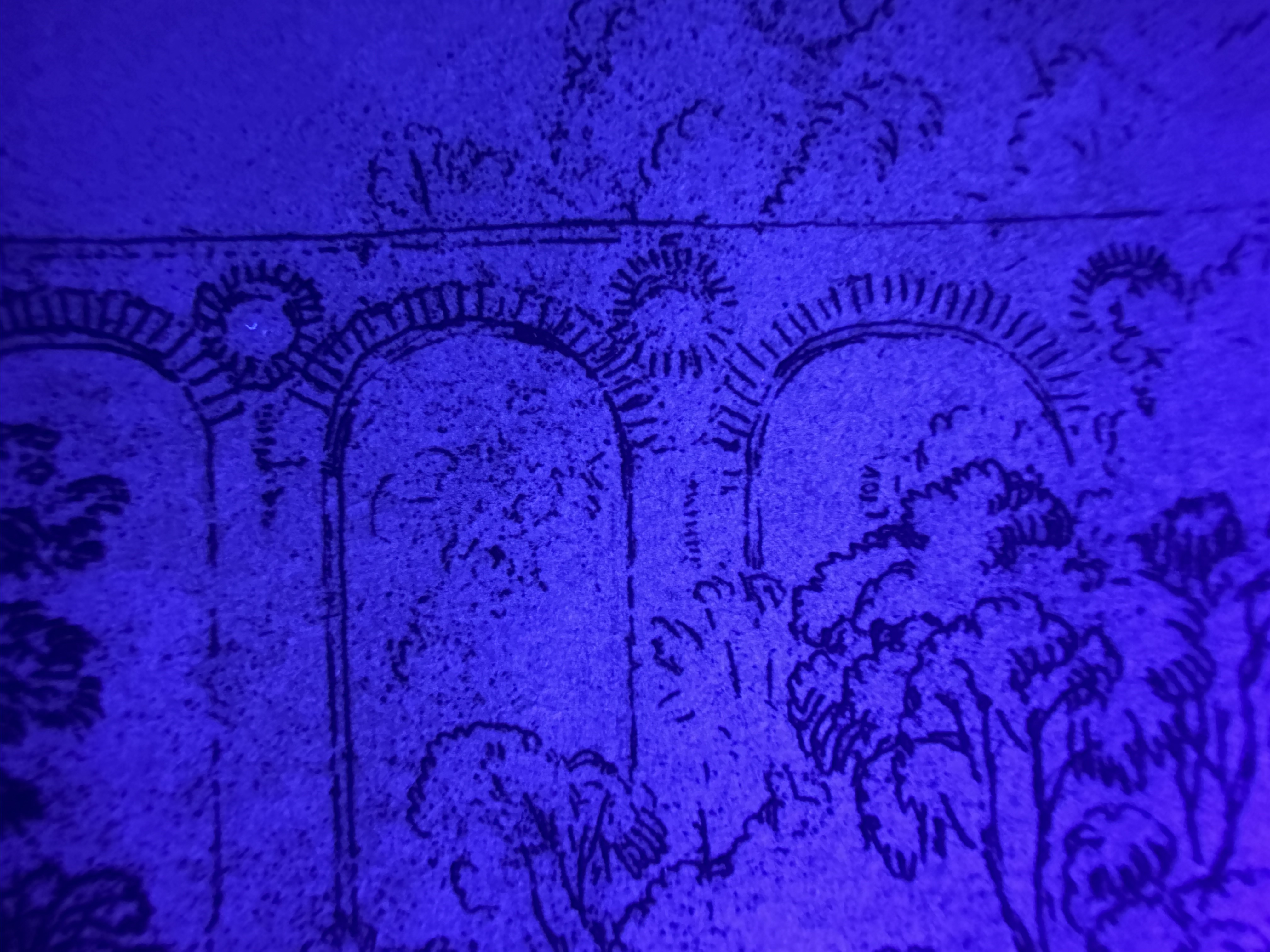 UV (365 nm) — paper and ink response