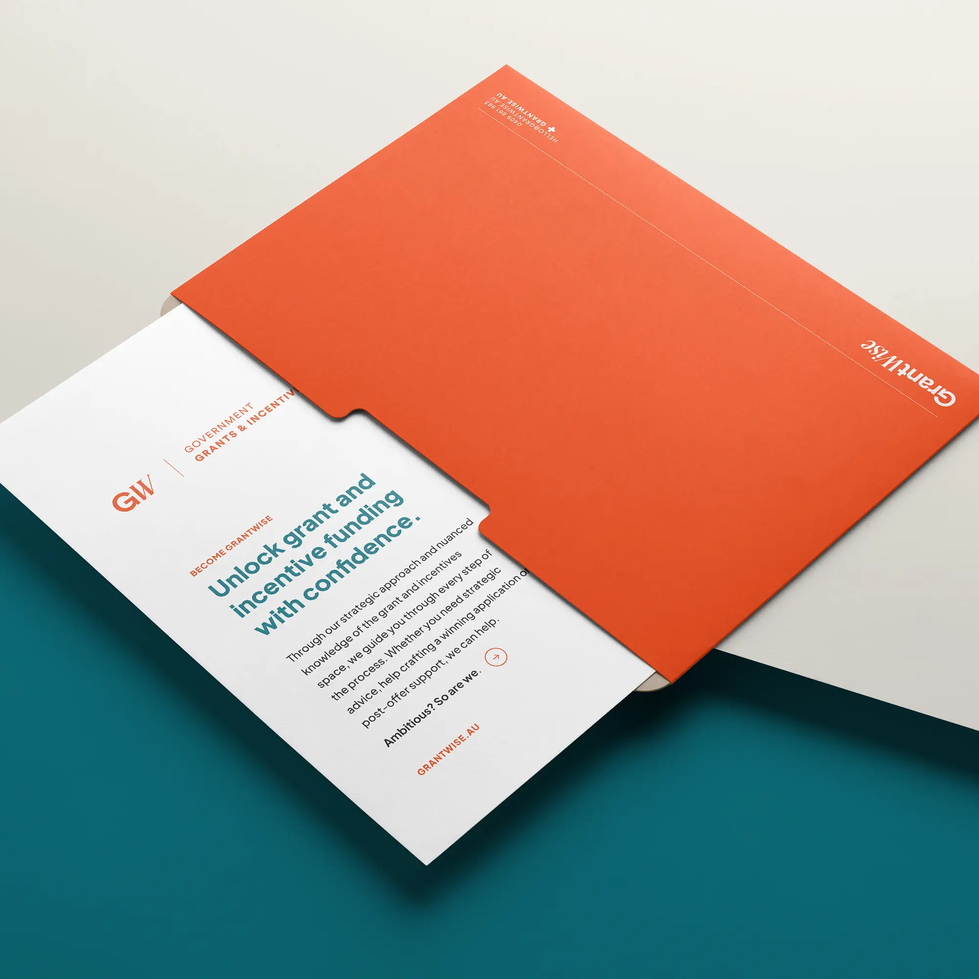 A GrantWise brochure on the edge of an office deck.