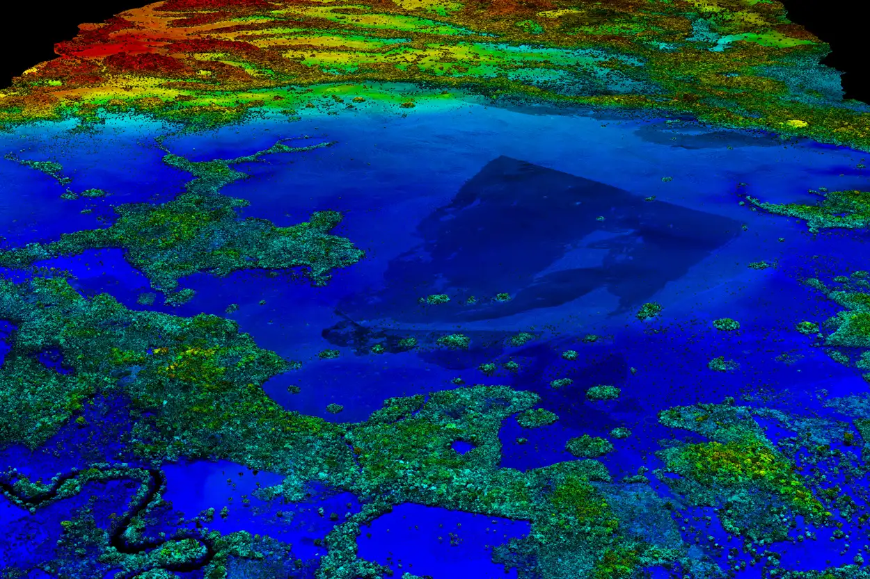 Colorful topographic map showing varied terrain elevations from blue lowlands to red highlands.