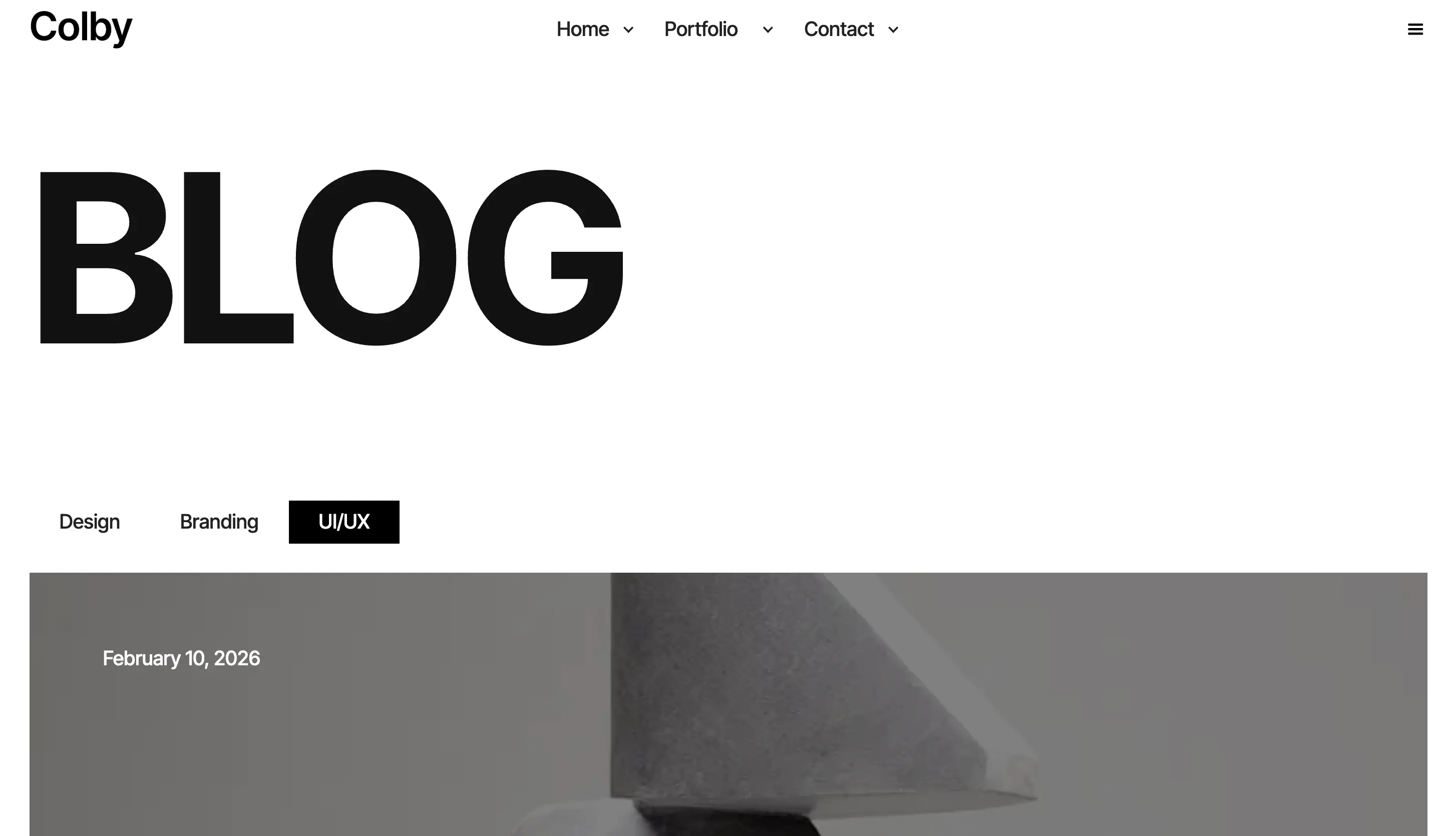 Colby blog page layout with bold minimal typography and clean header design.
