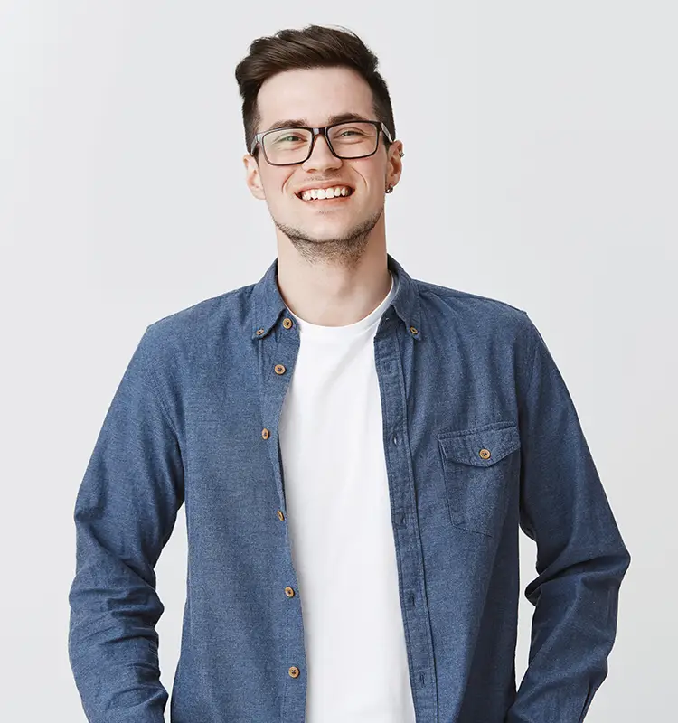 Photo of man wearing a glasses and blue shirt
