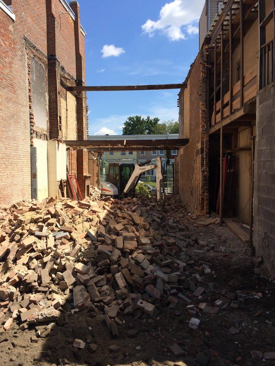 Construction site with piles of bricks