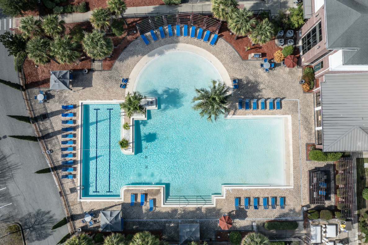 drone overhead shot of swimming pool 