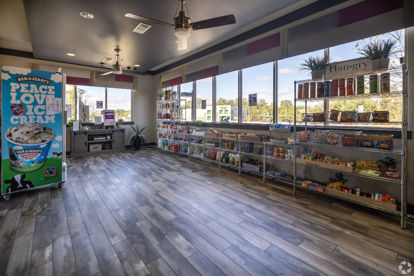 snack lounge with vending machine and shelfs with snacks