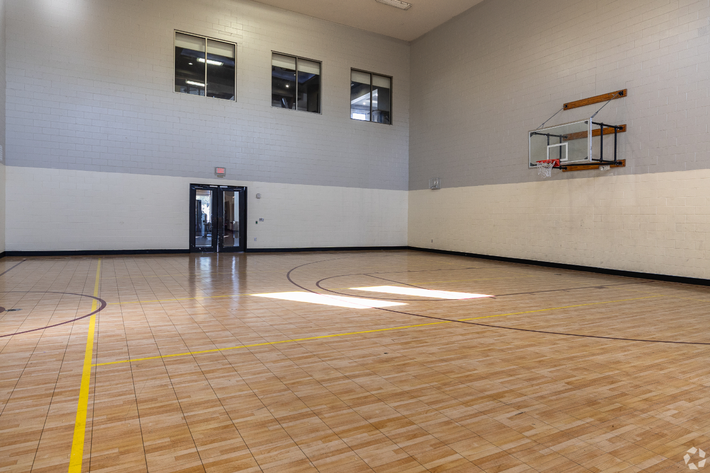 fitness center with free weights and training machinery 