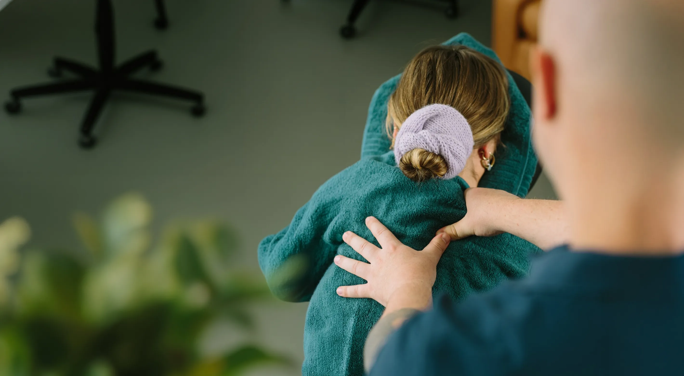 Corporate Calm therapist delivering workplace massage to a professional services consultant