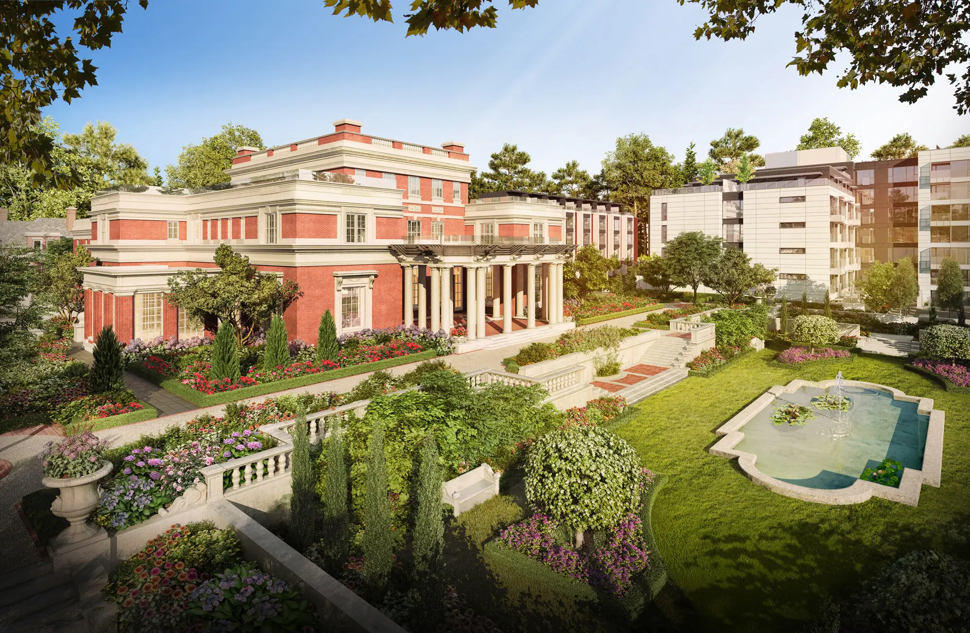Elegant red-brick building with columns surrounded by landscaped gardens and a pond with a fountain.