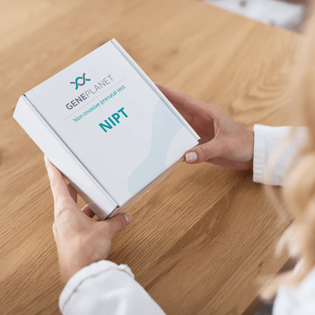 Woman holding NIPT box | NIPT by GenePlanet