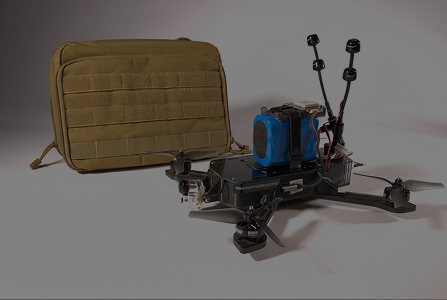 Black racing drone with four propellers and blue battery pack next to a tan tactical pouch.