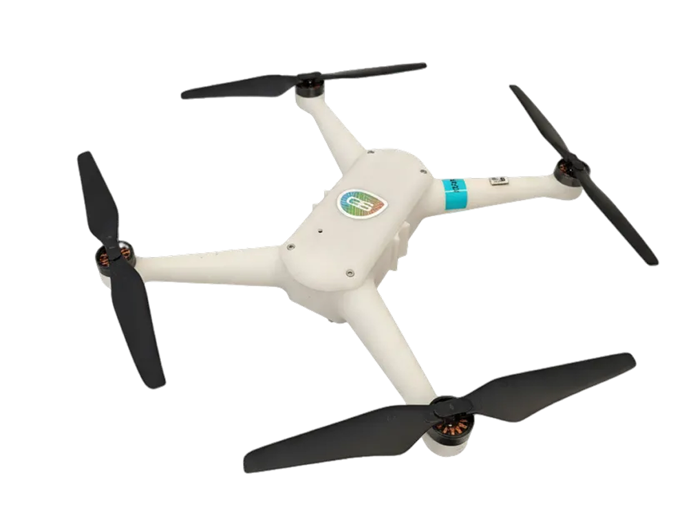 White quadcopter drone with four black propellers and a colorful emblem on top.
