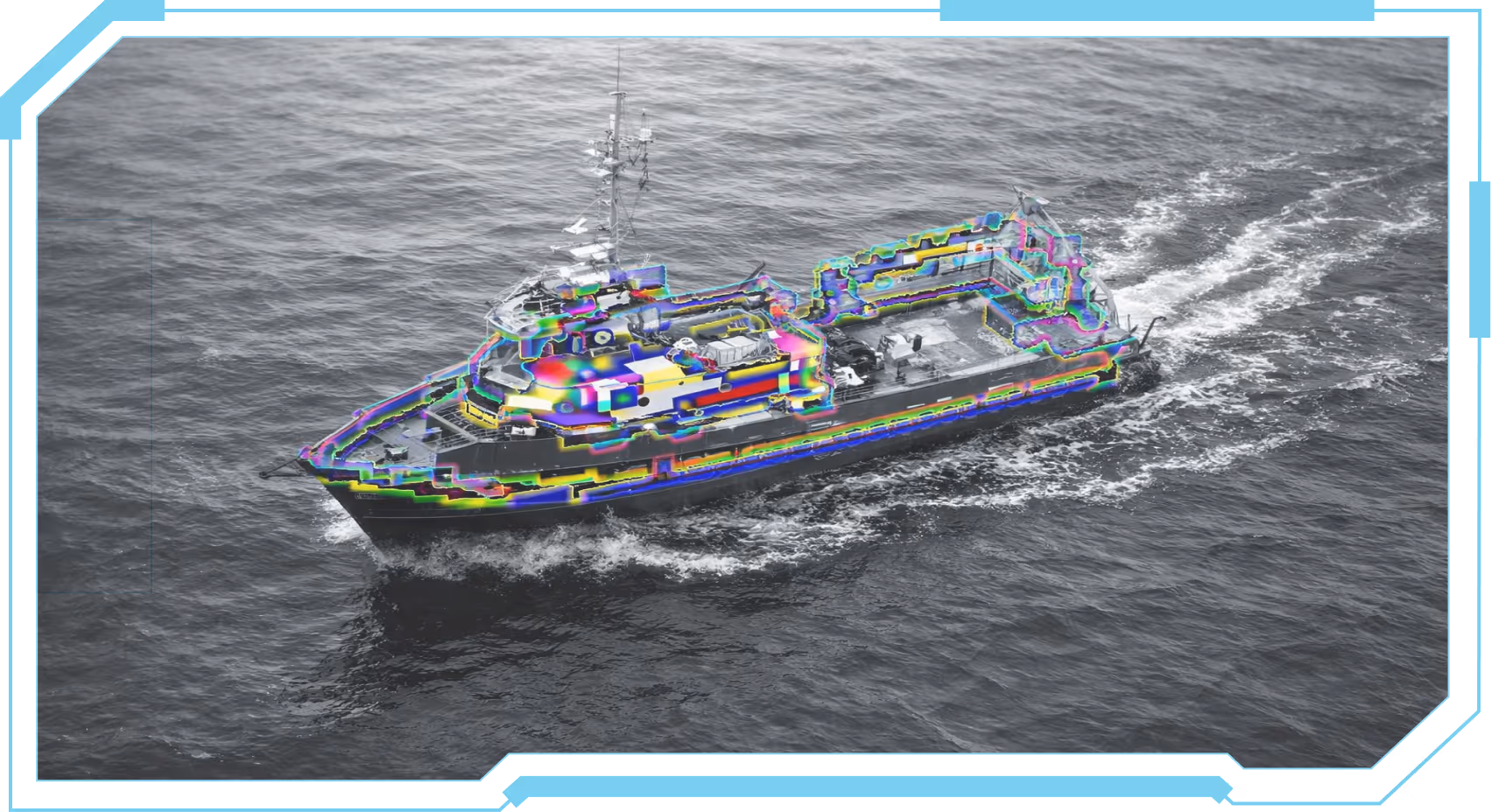 A black and white aerial view of a ship sailing through the ocean with colorful edge detection highlighting its structure.