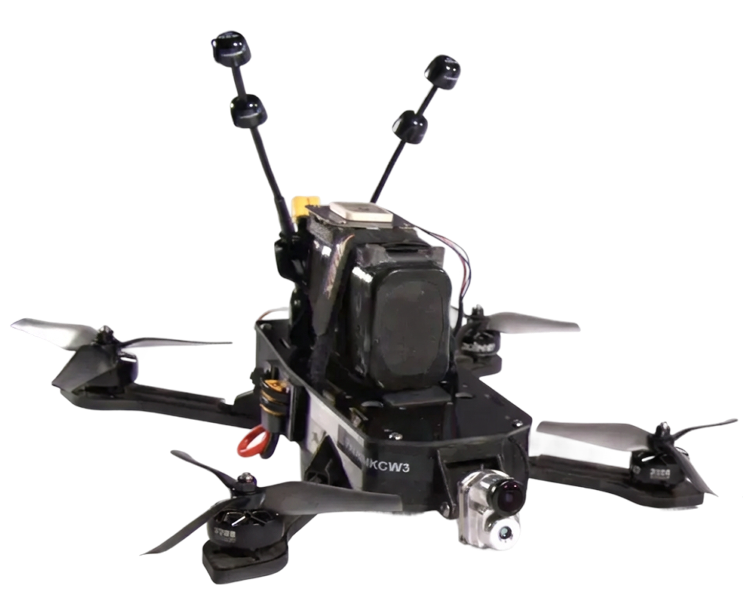 Black quadcopter drone with four propellers, a front camera, and two antennae.