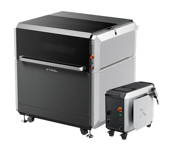 XTOL branded industrial machine in black and gray with a smaller connected unit on wheels.