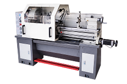 Industrial CNC metal lathe machine with protective cover and control panel.