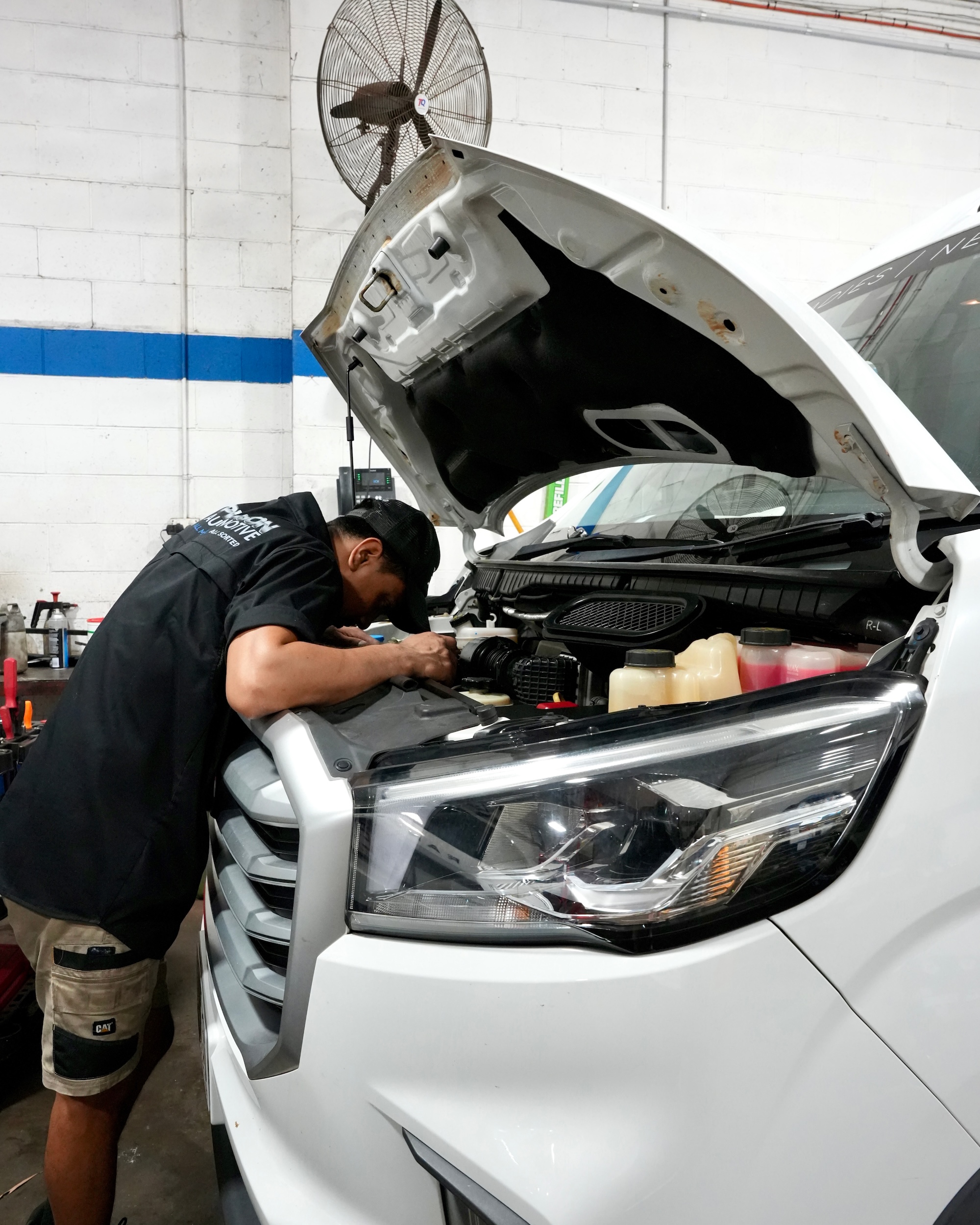The Pearson Automotive fleet management team servicing a commercial work van at their Milton workshop.