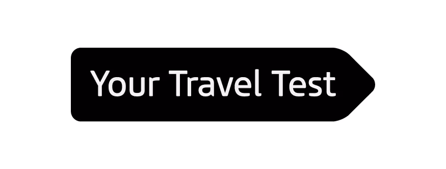 Button with text 'Your Travel Test' on a black rounded rectangular background with a pointed right edge.
