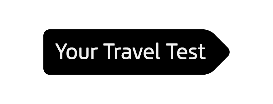 Button with text 'Your Travel Test' on a black rounded rectangular background with a pointed right edge.