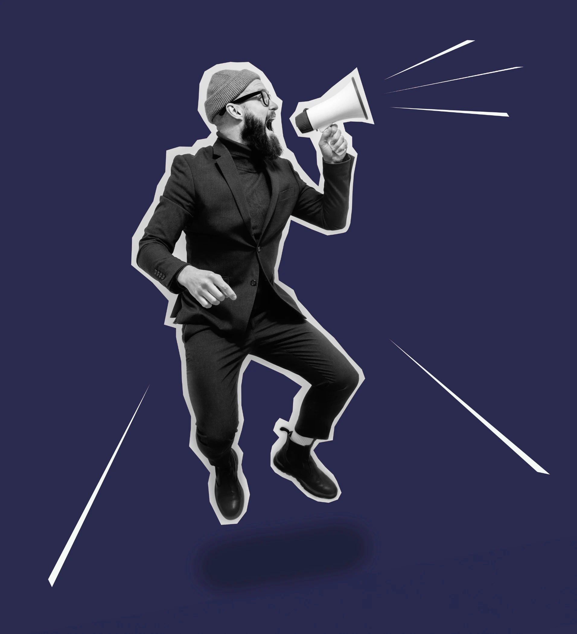 Man in black suit and beanie shouting into a megaphone while jumping against a dark blue background.