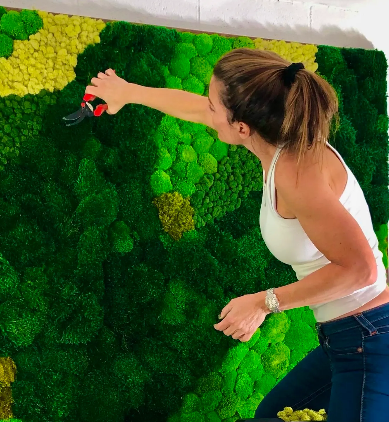 Mary creating a moss wall