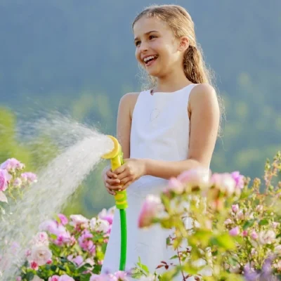 Proper garden watering with sprinkler summer irrigation guide