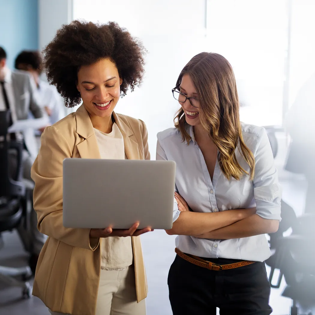 Team reviewing student rewards card education app on laptop.
