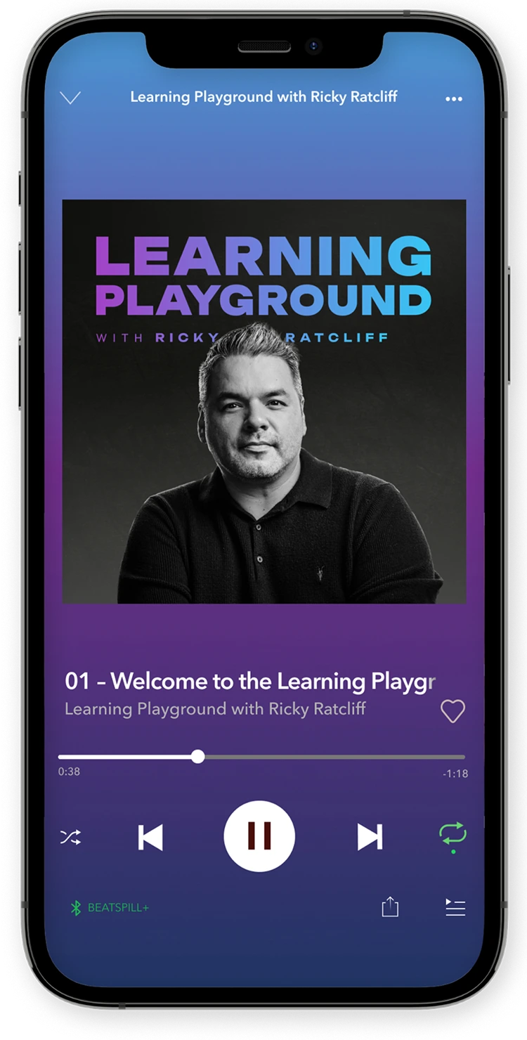 Smartphone screen showing the podcast 'Learning Playground with Ricky Ratcliff' playing episode 01 titled 'Welcome to the Learning Playgr' paused at 38 seconds.