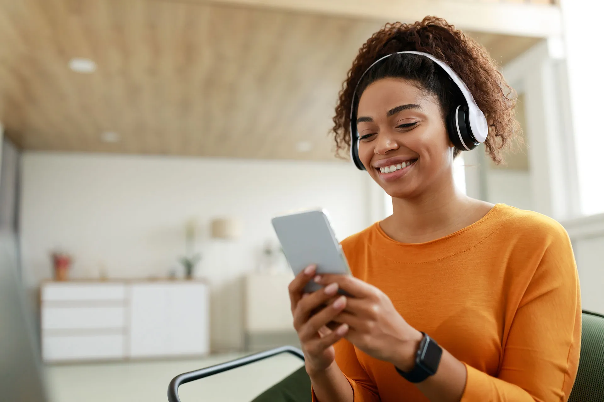Woman listening to a podcast