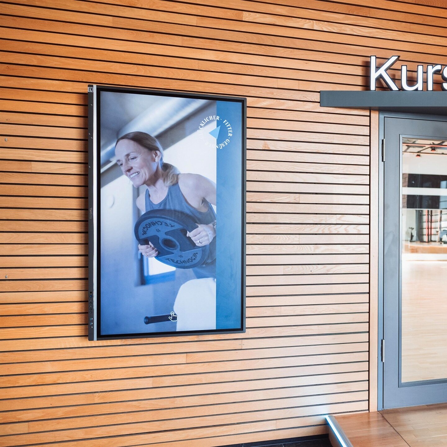 Interactive Digital Signage display at the Rückgrat Group's Alter Zollhof studio presents a training offer