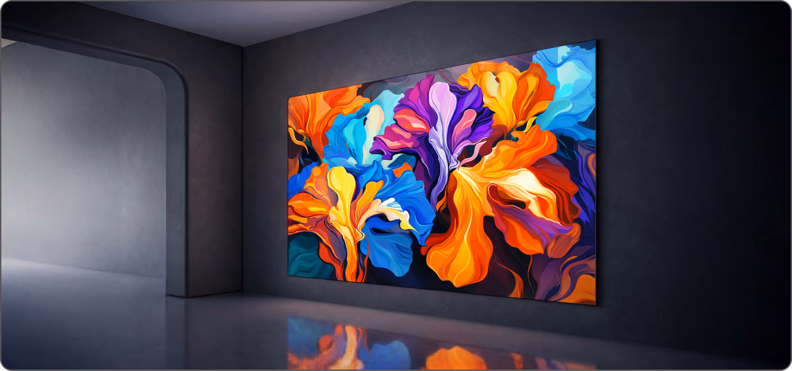 Large LED screen displaying a colorful abstract swirl pattern mounted on a black modular panel system against a dark background.