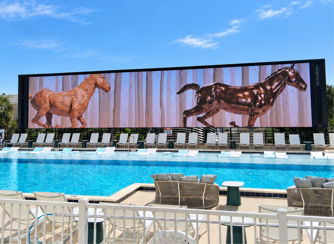 A rooftop needs to perform differently from one moment to the next. At Hyatt Regency in Orlando, the pool deck needed to support everything from everyday guest entertainment and multiple live games to private events calling for one large-scale visual experience. The challenge was creating an outdoor display that could move seamlessly between them while remaining exceptionally visible under the direct Florida sun.