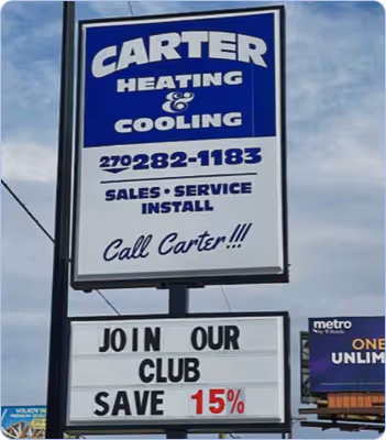 Carter Heating & Cooling sign with phone number and message: Join our club save 15%.