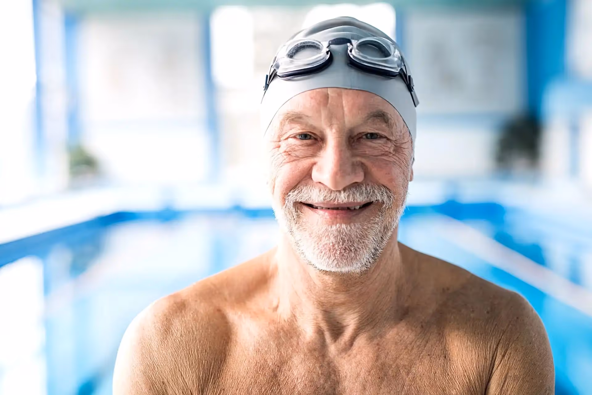 A man at a swimming pool.